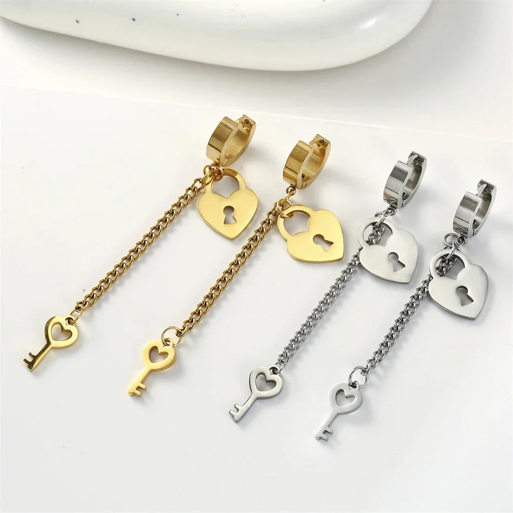 Gold key and lock drop earrings