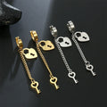 Gold key and lock drop earrings