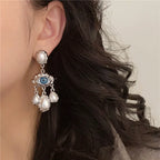 Blue Eye and Pearl Drop Earrings Silver