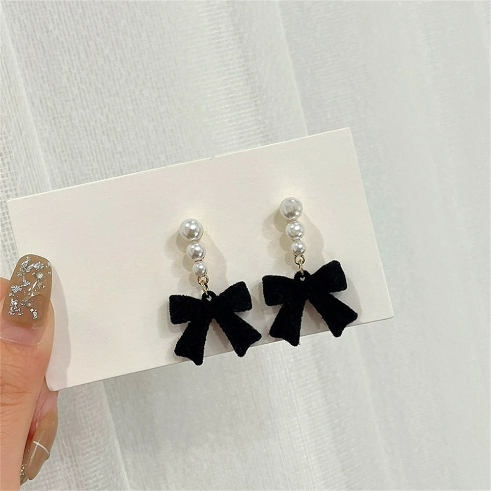 Black Pearl and Knot Dangle Earrings