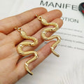 Serpent Reptile Earrings gold