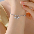 Adjustable angel wings silver bracelet