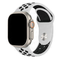 White and black Apple Watch Sport band