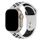 White and black Apple Watch Sport band