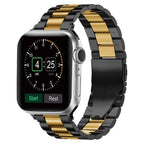 Apple Watch bracelet in black and gold metal