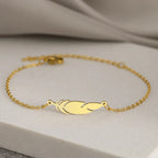 Charm Bracelet with Gold Feather