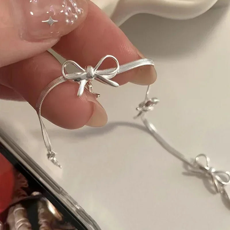 Bow tie bracelet for women silver