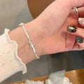 Bow tie bracelet for women silver
