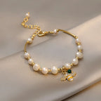 Bracelet with white beads bee