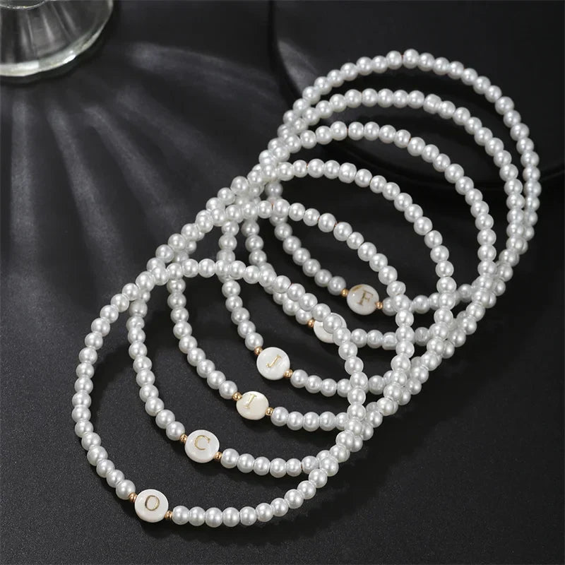 White bracelet initial