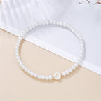 White bracelet initial A