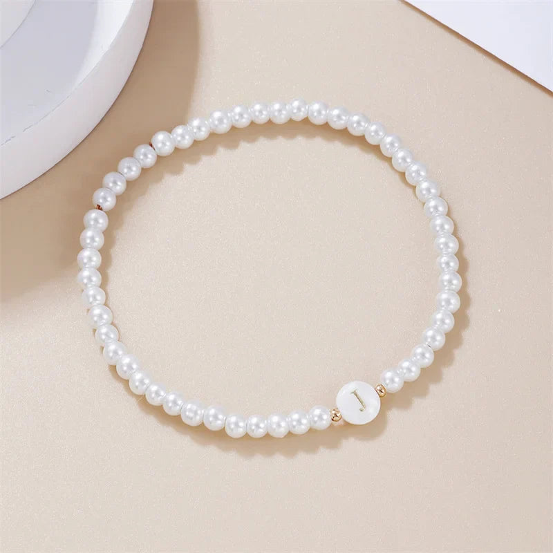 White bracelet initial J