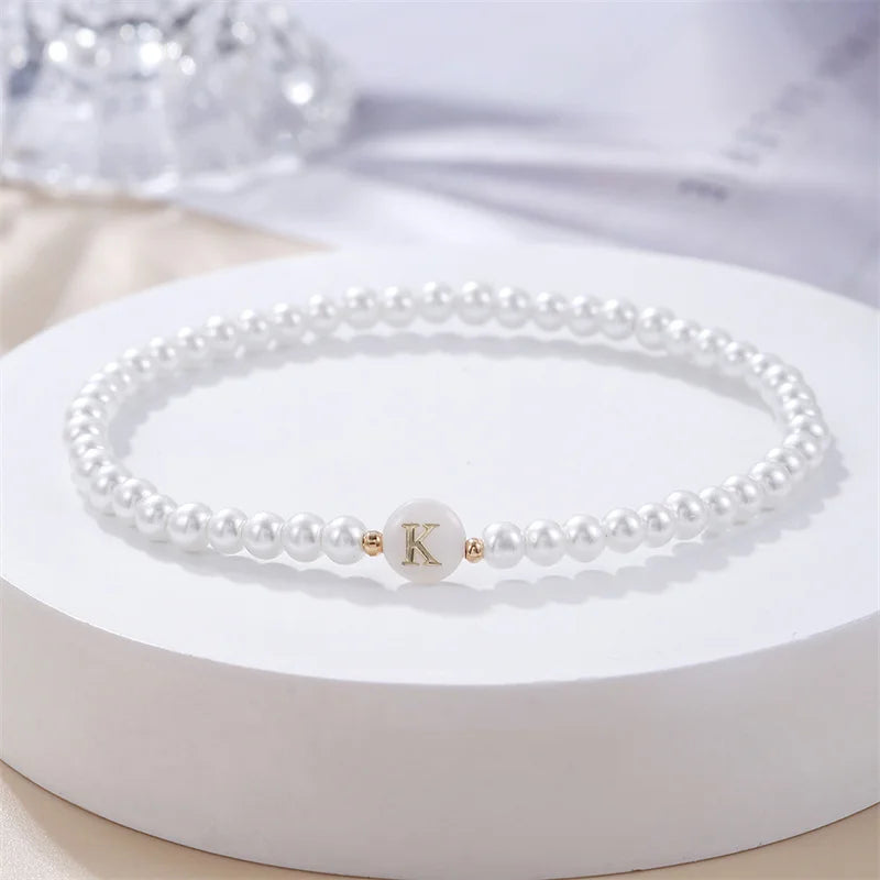 White bracelet initial K