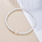 White bracelet initial W