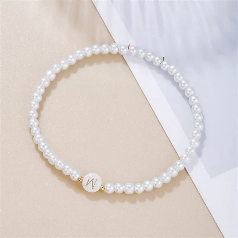 White bracelet initial W