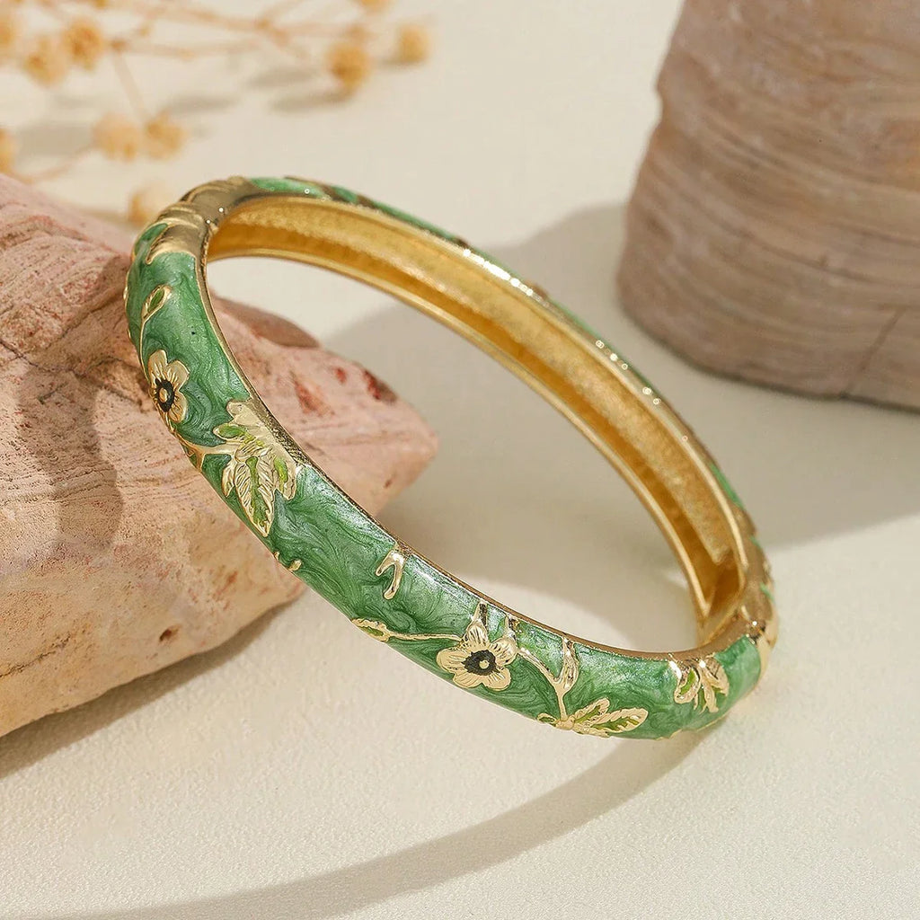 Colored Bracelets with green Flowers
