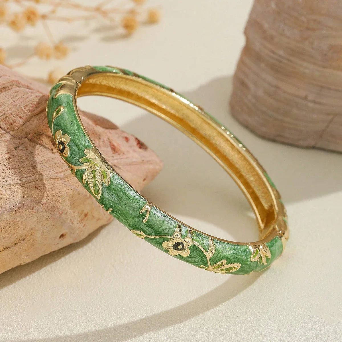 Colored Bracelets with green Flowers