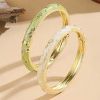 Colored Bracelet with green and white Flowers
