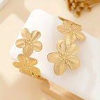 Women’s arm bracelet - gold flower petal bicep chain