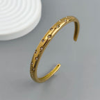 Elegant Bracelet with Star and Celestial Motifs Gold