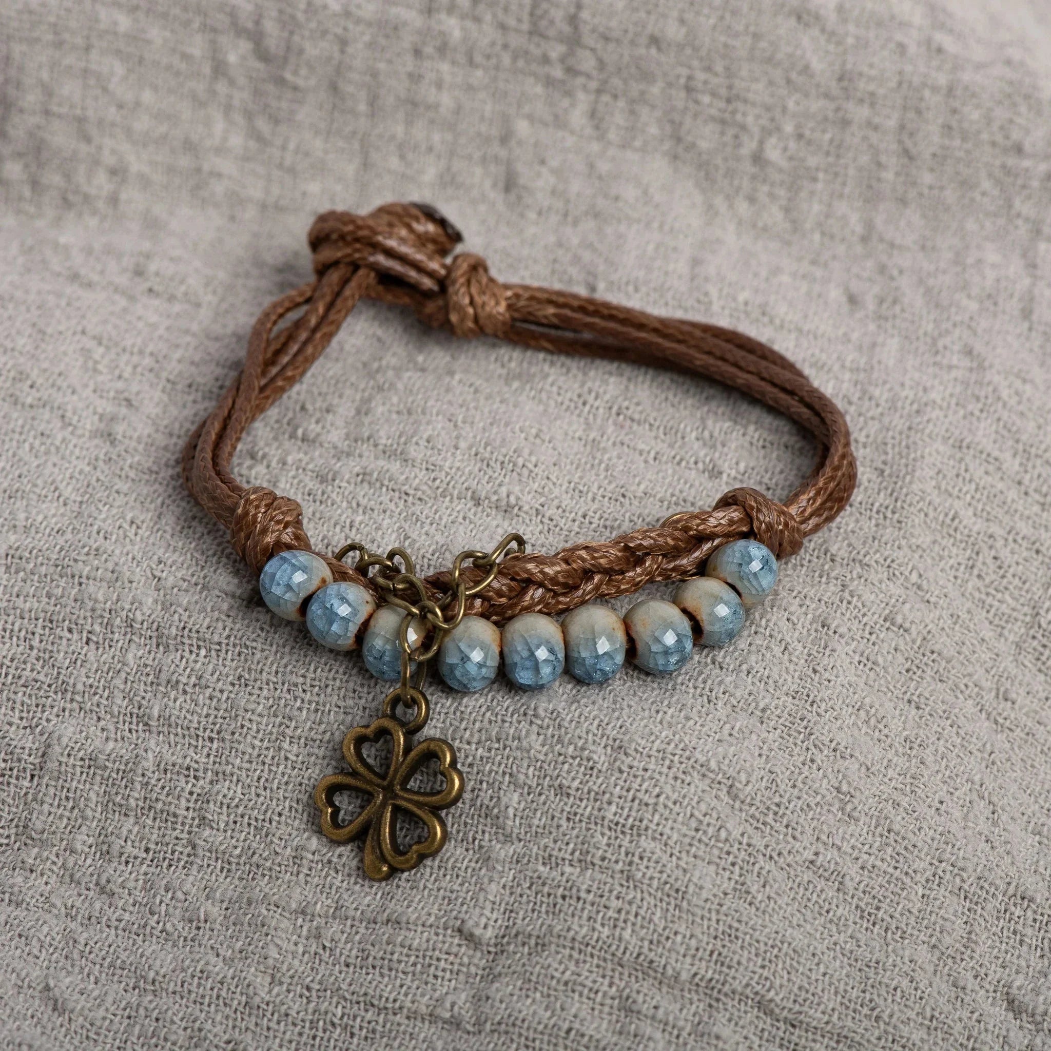 String Bracelet with Four-Leaf Clover and Blue Beads