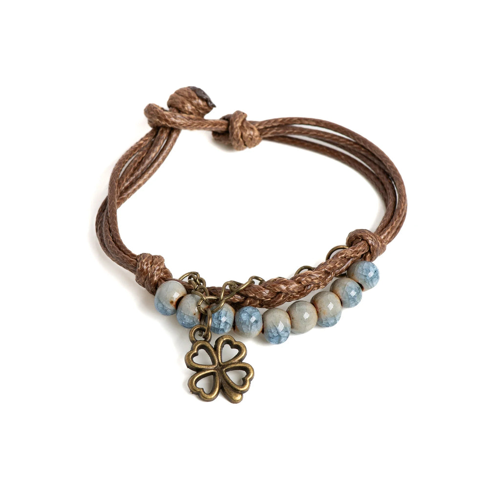 String Bracelet with Four-Leaf Clover and Blue Beads