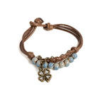 String Bracelet with Four-Leaf Clover and Blue Beads