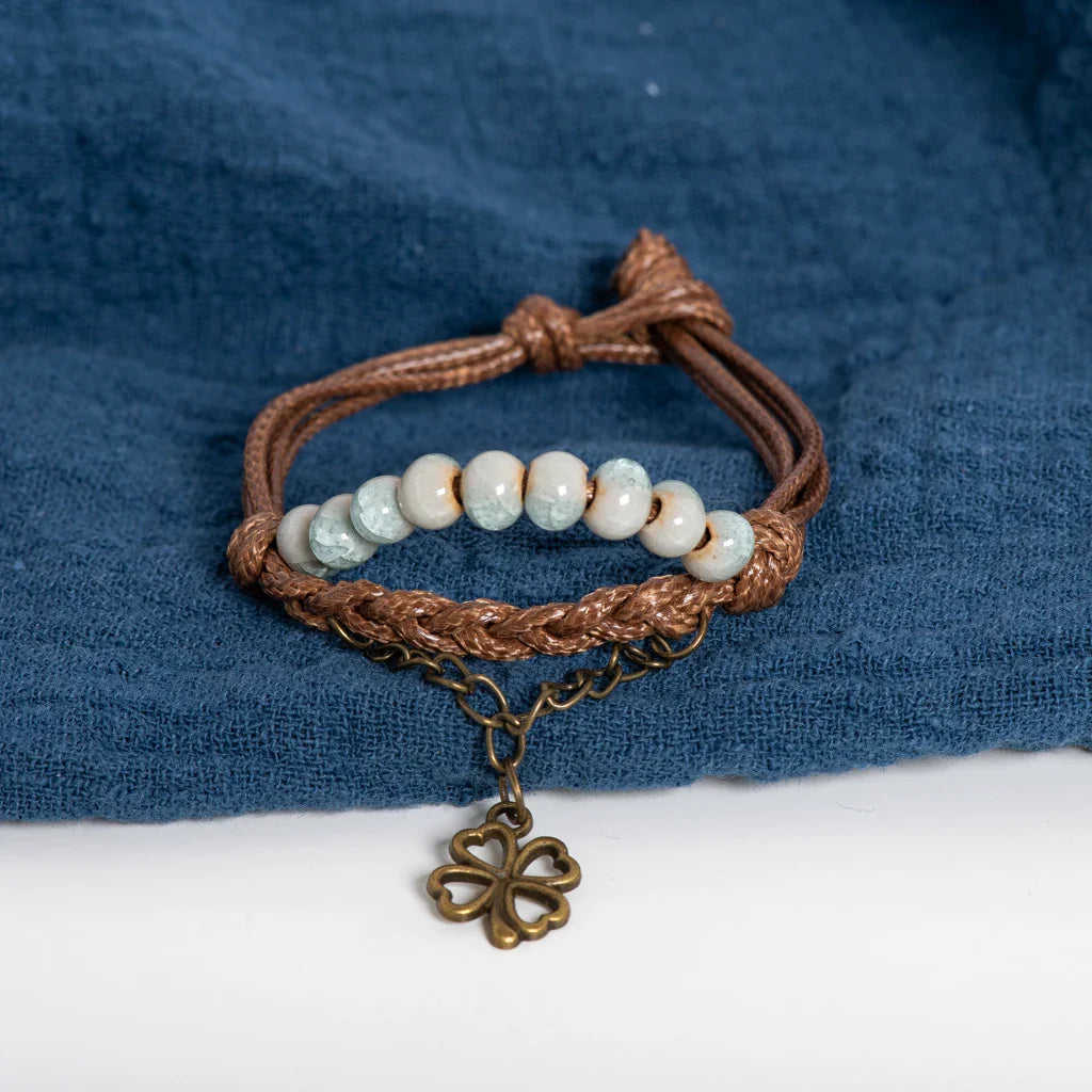 String Bracelet with Four-Leaf Clover and Light Blue Beads