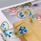 Transparent Resin Flower Curb Bracelet blue a