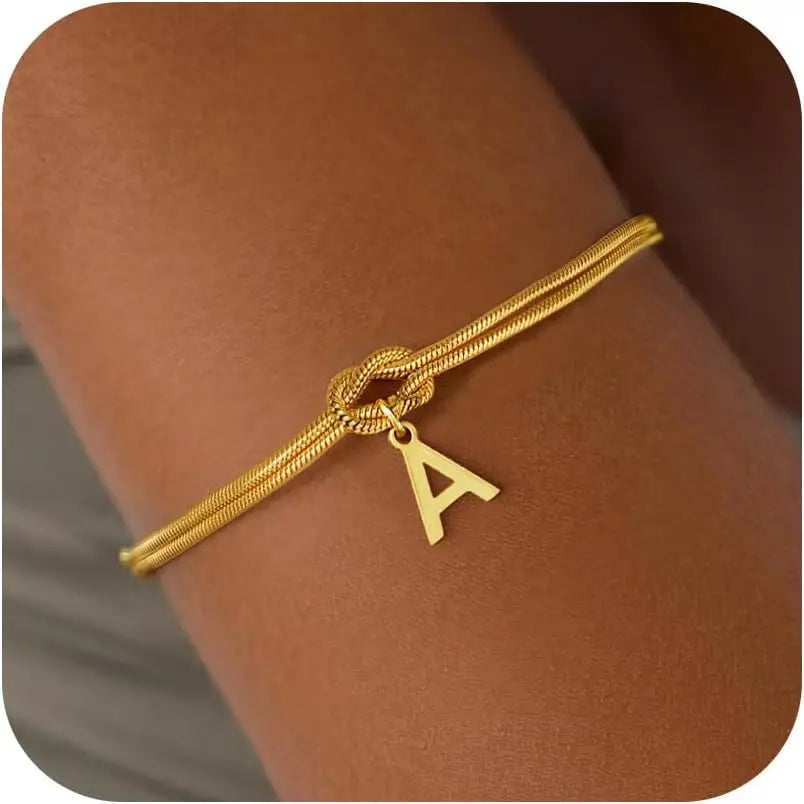 Initial and bow bracelet a