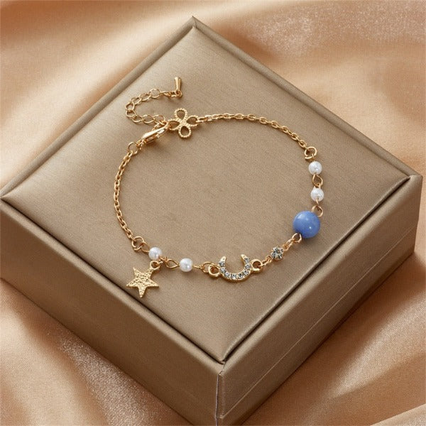 Moon and Star Women's Curb Bracelet Blue Celestial Motifs