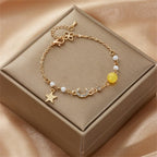 Moon and Star Women's Curb Bracelet Yellow Celestial Motifs