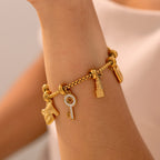 Women's bracelet with gold keys and padlocks