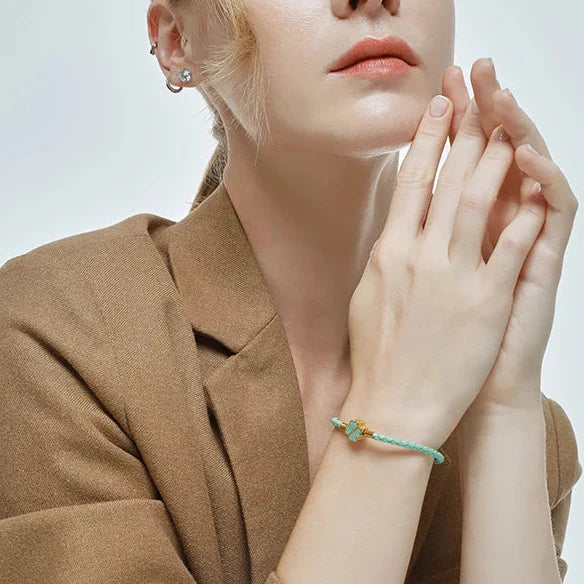 Braided Leather Bracelet with Green Four-Leaf Clover