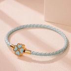Braided Leather Bracelet with Blue Four-Leaf Clover