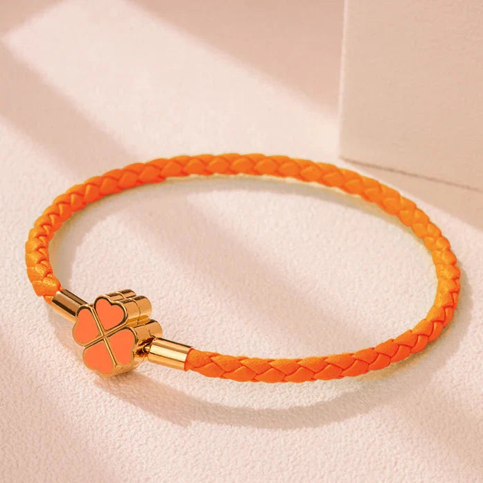 Braided Leather Bracelet with Orange Four-Leaf Clover