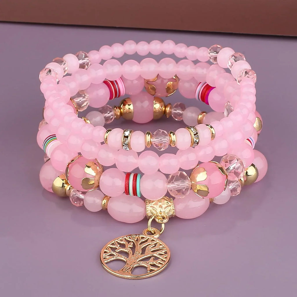 Bracelets with pink Tree of Life