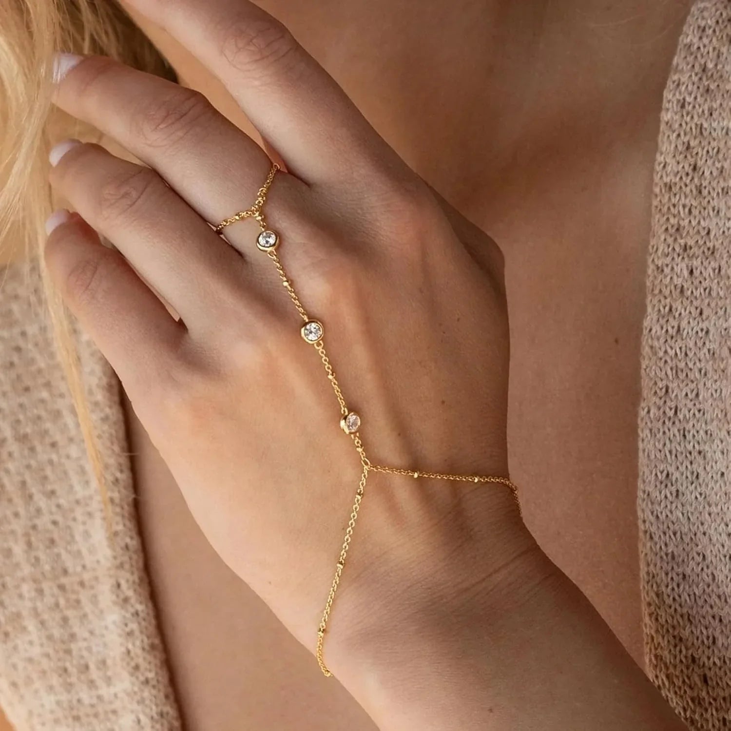 Hand and finger chain with zircons - women's hand bracelet gold