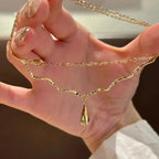 Asymmetrical Necklace with Teardrop Pendant