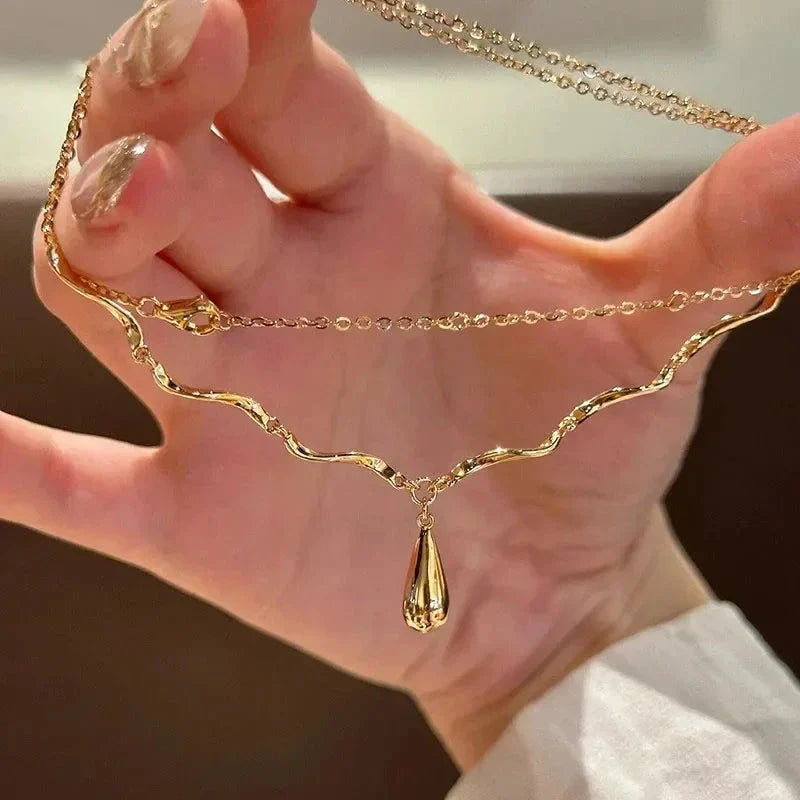 Asymmetrical Necklace with Teardrop Pendant