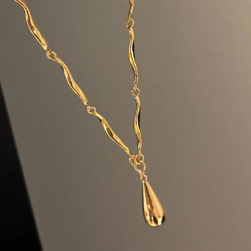 Asymmetrical Necklace with Teardrop Pendant