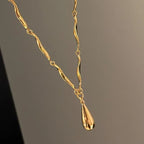 Asymmetrical Necklace with Teardrop Pendant