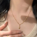 Asymmetrical Necklace with Teardrop Pendant