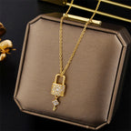 Necklace with key and padlock pendant gold