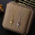 Necklace with key and padlock pendant gold