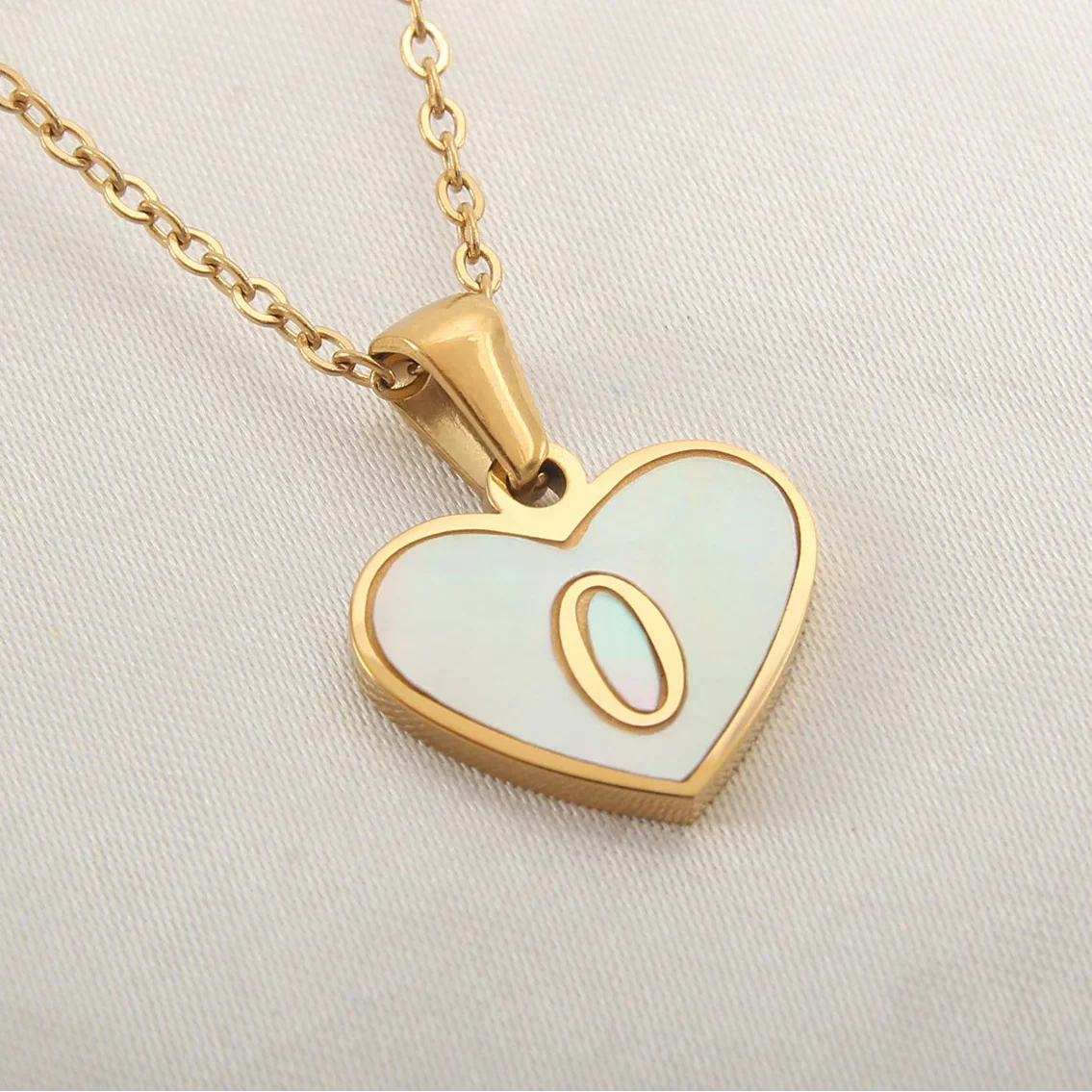 White heart pendant necklace initial o