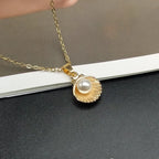 Necklace with Scallop Shell and Pearl Pendant gold