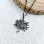 Necklace with Black Maple Leaf Pendant