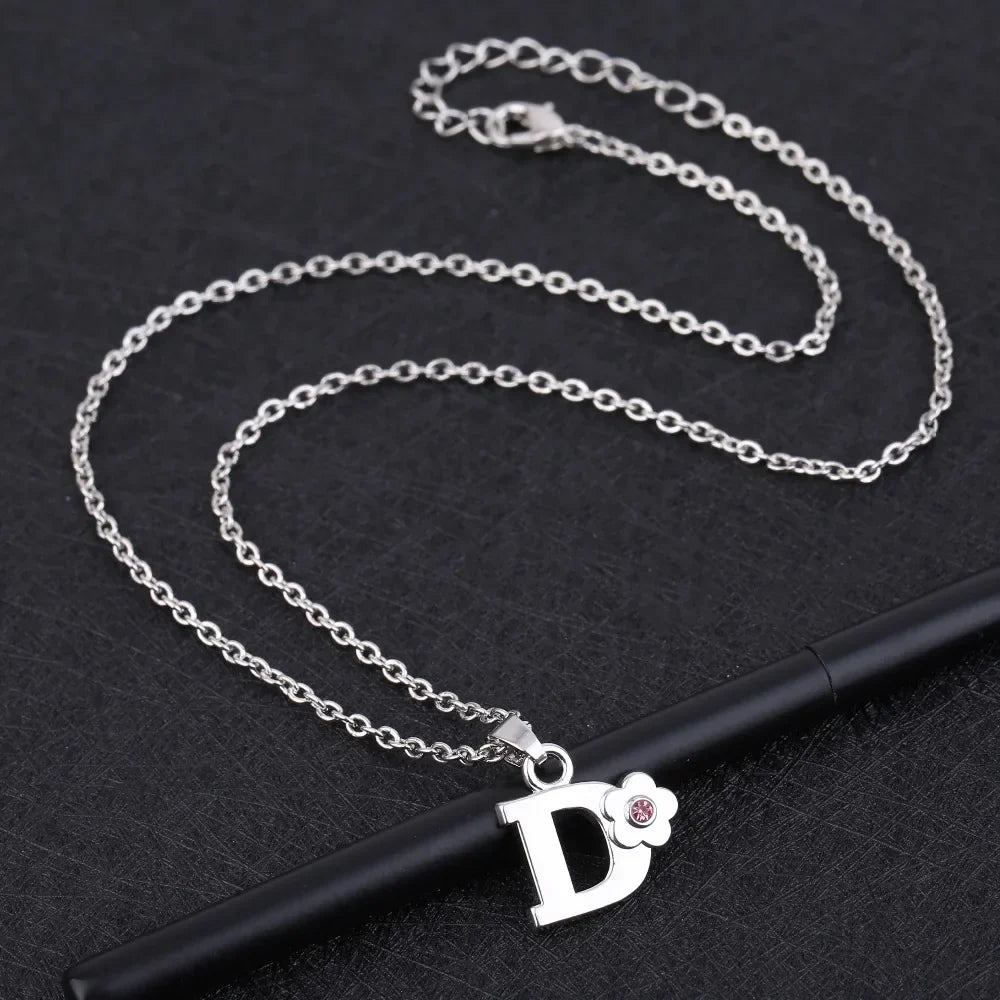 Necklace with initial and flower pendant d