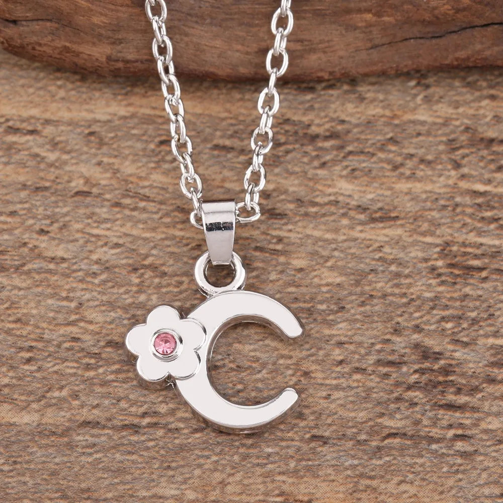 Necklace with initial and flower pendant c